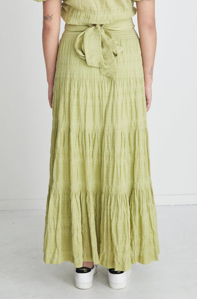 The Charming Pistachio Maxi Skirt is a stunning everyday skirt. Complete the set with the Siena Pistachio Tie Back Top. Maxi length Shirred waist Tiered skirt Main: 95% Cotton 5% Spandex Lining: 100% Cotton