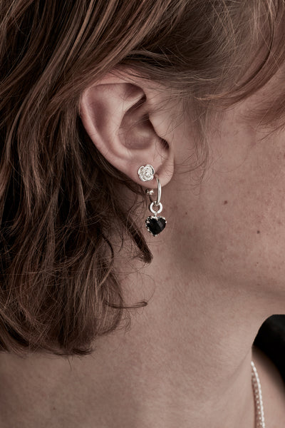 STOLEN GIRLFRIENDS CLUB ROSE BUD EARRINGS    The Stolen Girlfriends Club Bow Earrings are cute mini rose buds, these little roses are great for every day wear. Crafted using sterling silver, pair with other studs, match with Stolen's sleeper version of this stud or wear alone.      Sold as a pair     High polish sterling silver     Available in; Silver     Comes in a 'Stolen Girlfriends Club' jewellery box