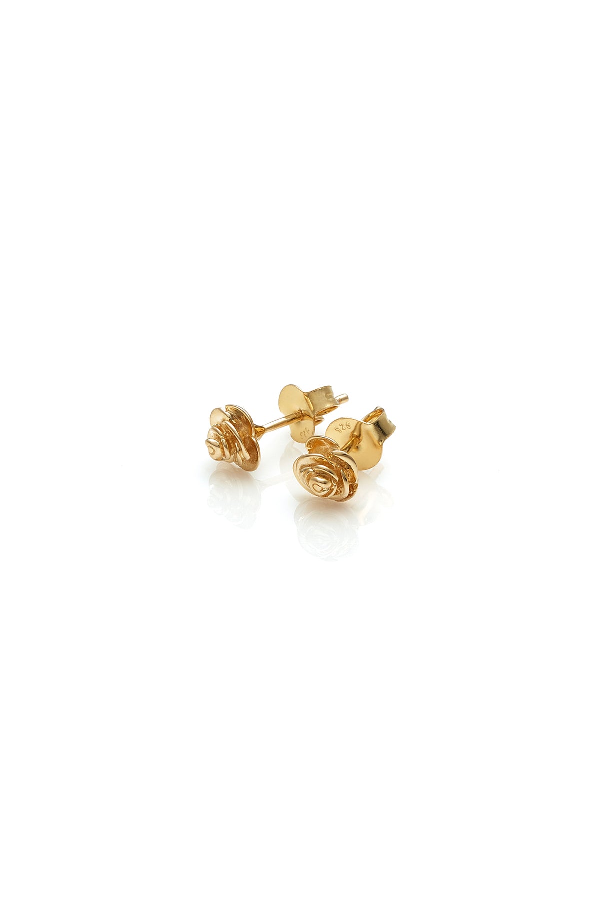 The Stolen Girlfriends Club Bow Earrings are cute mini rose buds, these little roses are great for every day wear. Crafted using 18k gold plating, pair with other studs, match with Stolen's sleeper version of this stud or wear alone.      Sold as a pair     High polish sterling silver     Available in; 18k Gold plating     Comes in a 'Stolen Girlfriends Club' jewellery box