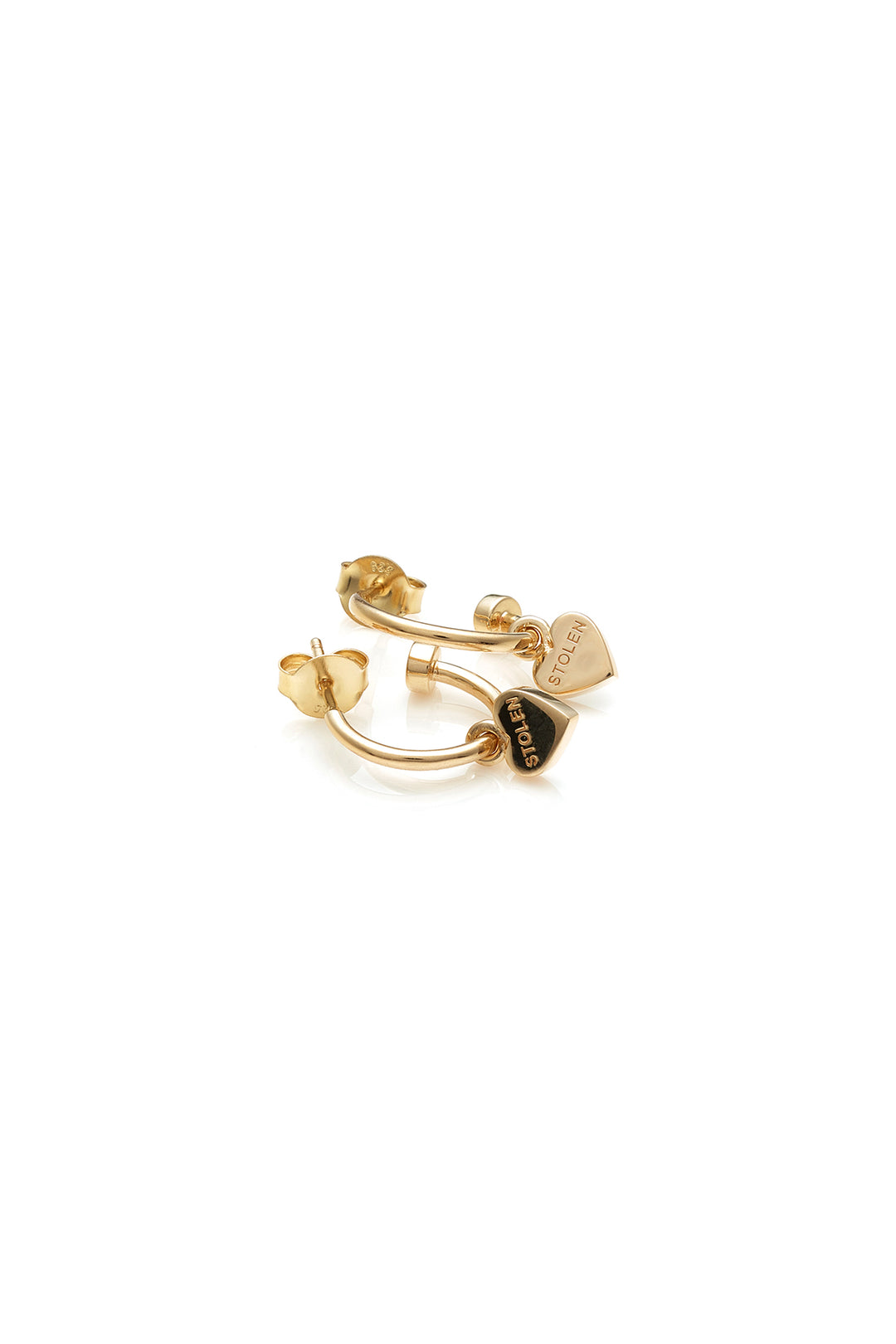 STOLEN GIRLFRIENDS CLUB STOLEN HEART ANCHOR SLEEPER  The Stolen Girlfriends Club Stolen Heart Anchor Sleepers are gorgeous half hoop stud-style, each suspending a mini heart, which features signature 'Stolen' engraving across the front.  These sleepers are great for every day wear. Crafted using 18k gold plating, pair these with the matching studs, other sleepers or wear alone.