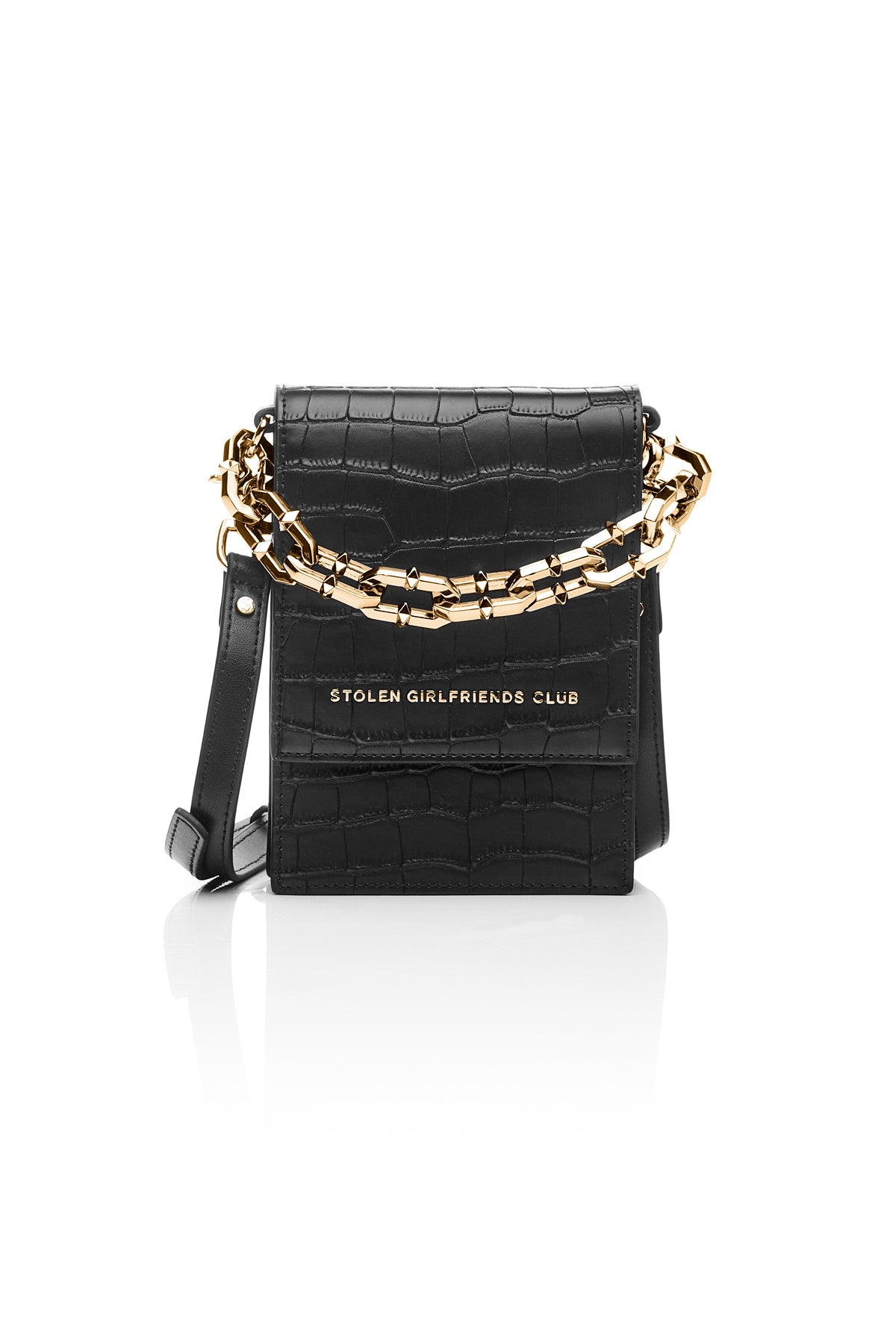 Taken from classic bourgeois silhouettes of the 60s and given a rock n roll reinvention, we introduce our On Tour Bag from our latest collection. Designed with sharp corners, and cleaner lines, this style has more structure and feels almost architectural. Beautifully crafted in our updated matte black colourway, this style comes with our additional detailed gold chunky chain. 