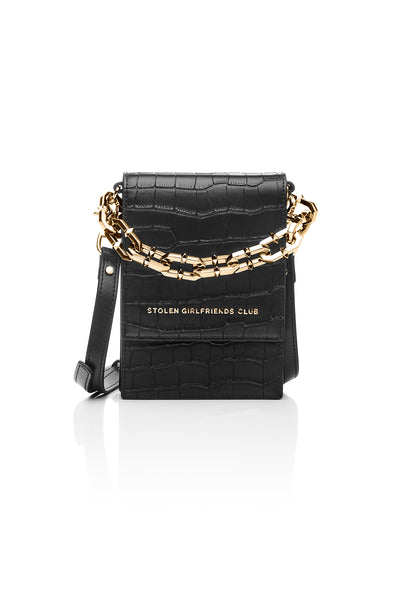 Taken from classic bourgeois silhouettes of the 60s and given a rock n roll reinvention, we introduce our On Tour Bag from our latest collection. Designed with sharp corners, and cleaner lines, this style has more structure and feels almost architectural. Beautifully crafted in our updated matte black colourway, this style comes with our additional detailed gold chunky chain. 