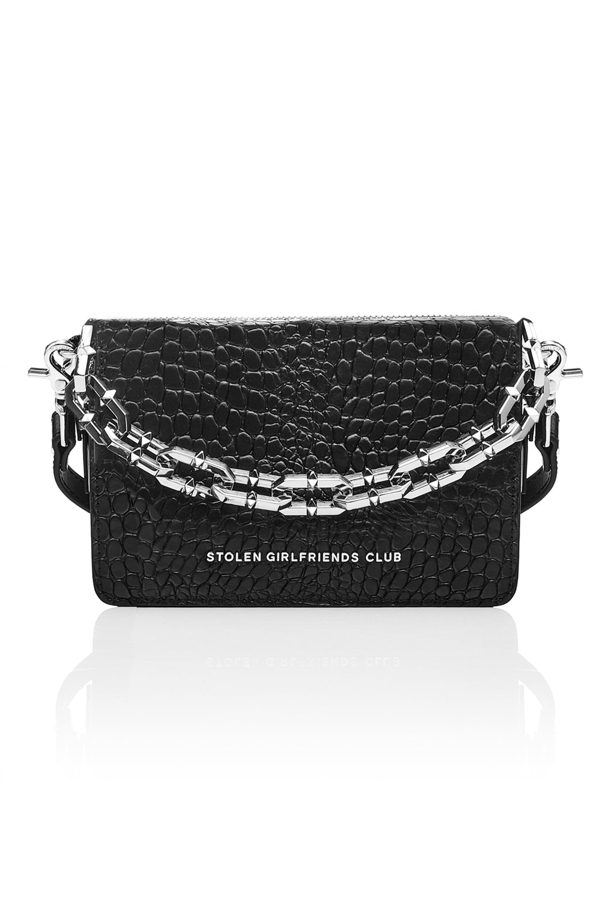 The Stolen Girlfriends Club Little Trouble Bag is an edgy crossbody bag, now available in Matte Black.  Crafted in 100% genuine leather and features a funky crocodile texture throughout.  The Little Trouble Bag opens via a magnetic flap, and features a metal 'Stolen Girlfriends Club' plaque at the front, internal card slots, two internal zipper pockets, and comes with plain self and optional chunky chain straps.