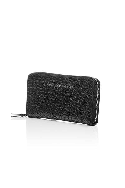 Taken from classic bourgeois silhouettes of the ’60s and given a rock n roll reinvention, we introduce our Big Trouble Wallet in our updated matte black colorway. Designed with sharp corners, cleaner lines, and angular features, this style has more structure and feels almost architectural. Beautifully crafted in a rich crocodile-effect texture, this has a modernized matte leather finish.