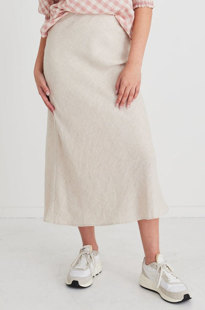 A fresh take on the classic bias midi skirt, the RE: Union skirt is 100% soft linen. A perfect transition piece from work to date night, this stunning skirt can easily be dressed up for any occasion.       Bias cut     Elasticated waist     100% Linen
