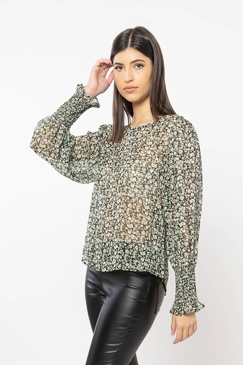 Introducing The Leila + Luca Timely Top now available in a stunning green floral print. Always a best selling style for its simplicity and easy wearing the timely top features a crew neckline and shirred elasticated cuff sleeves. It will become your go to piece from a night out to lunch with the girls ! 100% polyester  Shirred cuffs Crew neckline 8,10,12,14