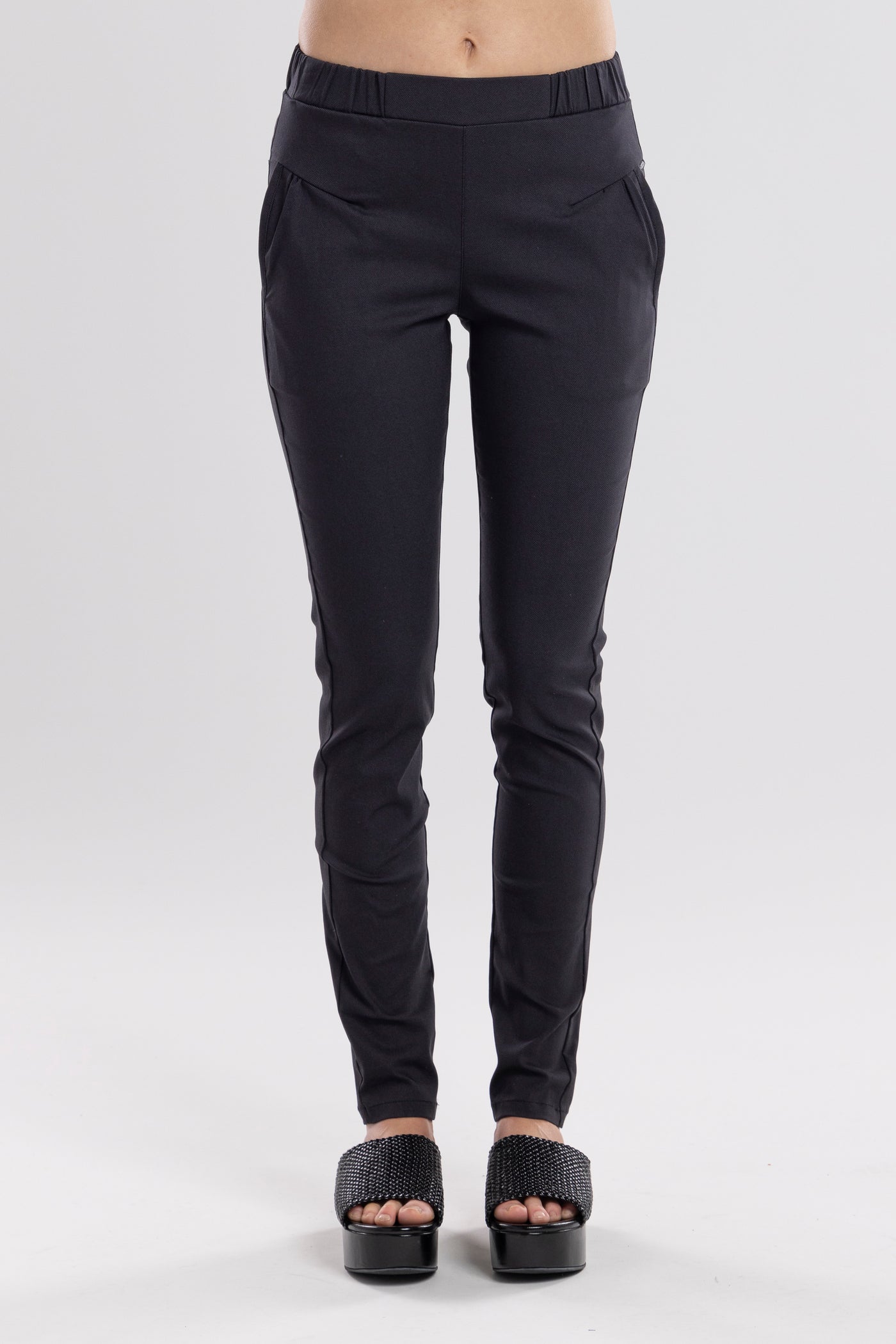 NES DARTSTA PANT  The Nes Dartsta pant are a wardrobe staple. The Dartsta pants have a tailored look and are crafted from a soft stretchy fabric for ultimate comfort. The Dartsta pants feature a side angled pocket, flat front and elasticated waist. The Dartsta pants are the perfect pant for work, special occasions or daily wear.  Worn perfectly back with any of the Nes tops 