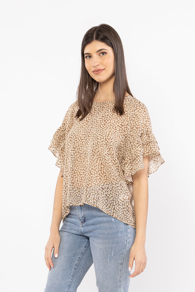 The Day Dreamer Top is such a fun feminine style. It features frill sleeves and a split at the back. Team back with your favourite bottoms this summer.  100% polyester  Frill sleeves Split at back