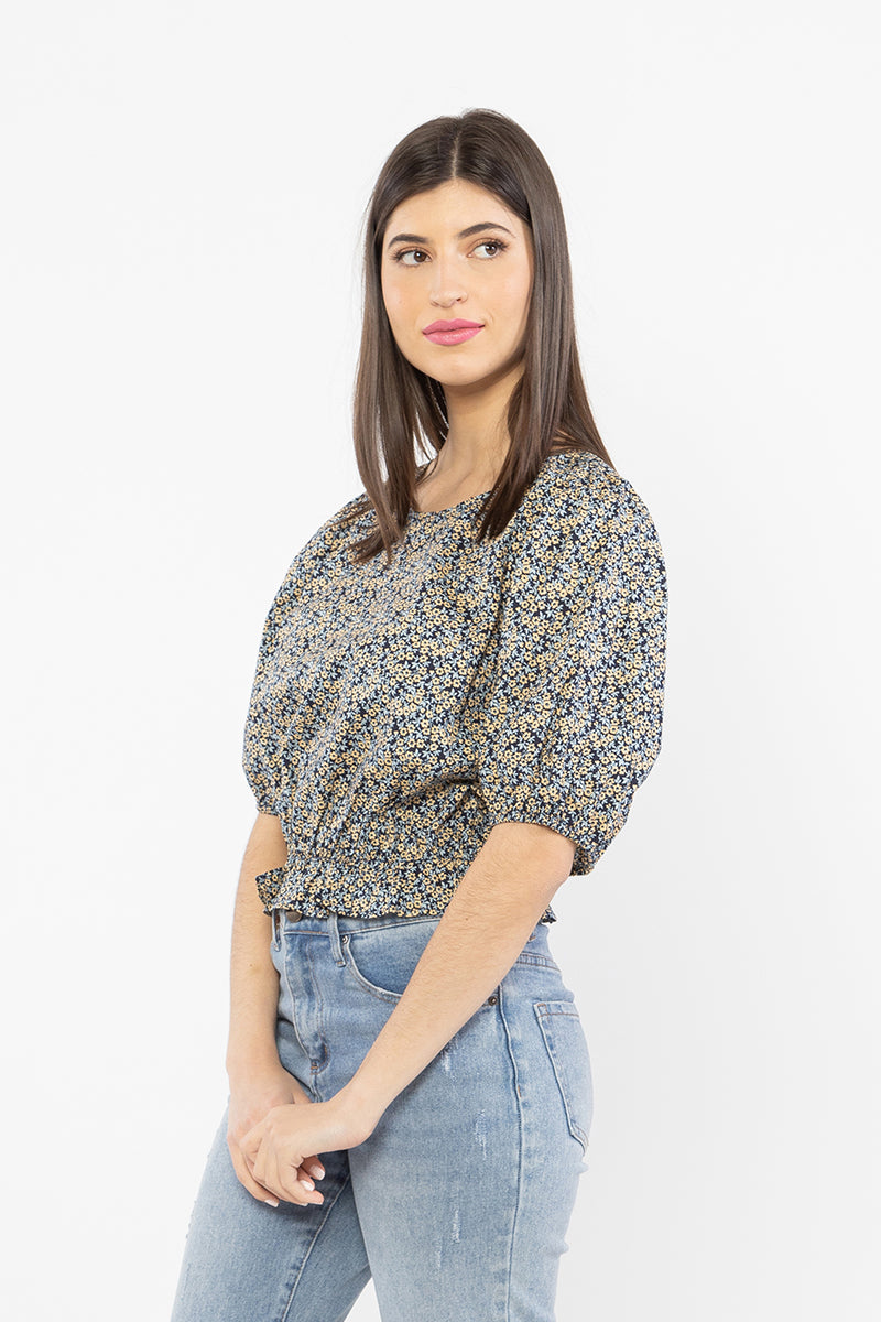 The Inquisitive top is a cutie! Crafted from 100% cotton, it will be your go to this summer. It is slightly cropped and finished with an elasticated frill. Team back with denim for an simple but fun look.  Slightly cropped Frill detail 3/4 sleeve 100% cotton