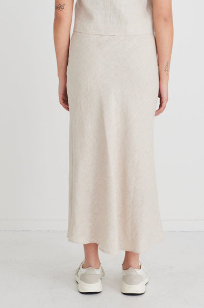 A fresh take on the classic bias midi skirt, the RE: Union skirt is 100% soft linen. A perfect transition piece from work to date night, this stunning skirt can easily be dressed up for any occasion.       Bias cut     Elasticated waist     100% Linen