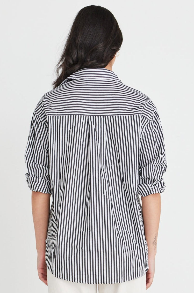 Introducing the You Got This shirt from Stories be told. This oversized poplin shirt is the ultimate combination of comfort and style. This shirt features an oversized fit and a relaxed and effortlessly stylish look that can be dressed up or down. The classic collar and button-front design add a touch of sophistication to this casual wardrobe essential.      Oversized fit      Poplin      Button-down      Front Pocket      Cuffed     100% Cott