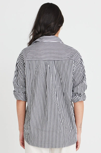 Introducing the You Got This shirt from Stories be told. This oversized poplin shirt is the ultimate combination of comfort and style. This shirt features an oversized fit and a relaxed and effortlessly stylish look that can be dressed up or down. The classic collar and button-front design add a touch of sophistication to this casual wardrobe essential.      Oversized fit      Poplin      Button-down      Front Pocket      Cuffed     100% Cott