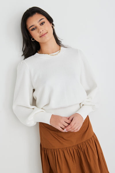 The Belladonna knit by Ivy + Jack comes in ivory making it the perfect knit for Spring! We love the luxe poet sleeves and cropped style, Pair this is your favourite jeans and boots for a chic everyday look.      Poet Sleeves     Cropped style     Fine Knit     High Neckline
