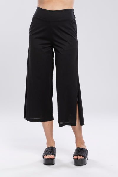 Ultimate in comfort & style! The division knit pant is a breeze to wear, super light & versatile Featuring a flat front, elasticated back waist & side pockets      7/8 length     Black     Mercerised cotton