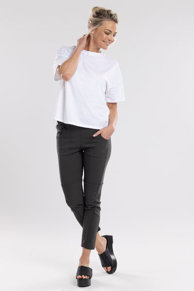 The Section pant features fabulous spliced detailing. They feature a flattering flat front, elasticated back and have side pockets. The section pant is an everyday style that will take you from work to leisure. They are a cropped length and finish above the ankle.      Viscose, spandex & polyester