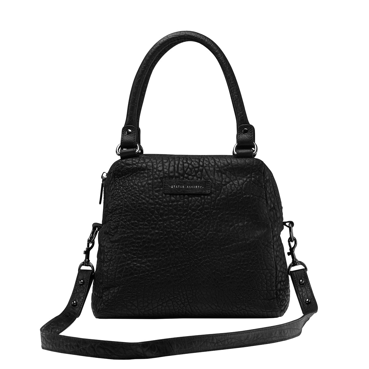 STATUS ANXIETY LAST MOUNTAINS BAG  The Status Anxiety Last Mountains Bag is the perfect bag for us girls who need a bigger bag for all our daily essentials!  In trendy Tan, Khaki, Green, Black Bubble or Navy Blue, this compact yet tall design was crafted using soft shrunken Brazilian pebble leather.
