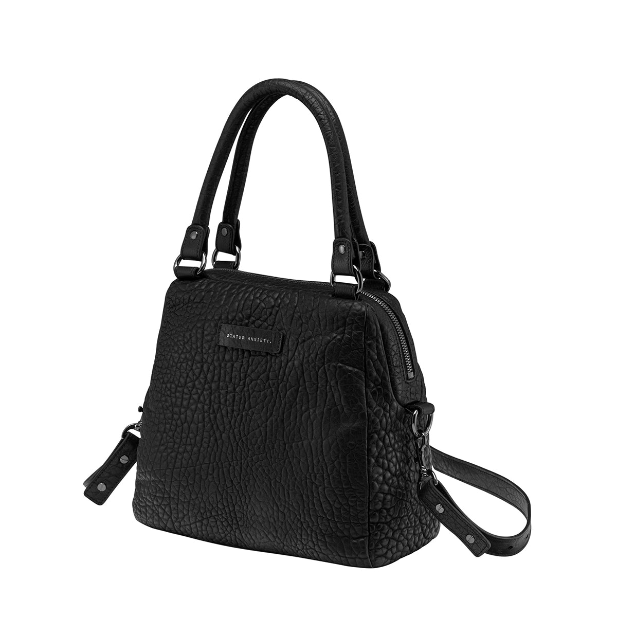 STATUS ANXIETY LAST MOUNTAINS BAG  The Status Anxiety Last Mountains Bag is the perfect bag for us girls who need a bigger bag for all our daily essentials!  In trendy Tan, Khaki, Green, Black Bubble or Navy Blue, this compact yet tall design was crafted using soft shrunken Brazilian pebble leather.