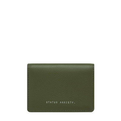 It's particularly important to keep your cool when you find yourself in a tight situation. The 'Easy Does It' wallet is perfect for just such a squeeze. Made to carry a stack of cards and a few folded notes, yet slim enough to throw in your back pocket.  Soft shrunken pebble leather 6 card slots (slots can be doubled up to fit 12) 2 open slots to stash folded banknotes and receipts 11cm x 8cm x 1.5cm Comes in a Status Anxiety box packaging