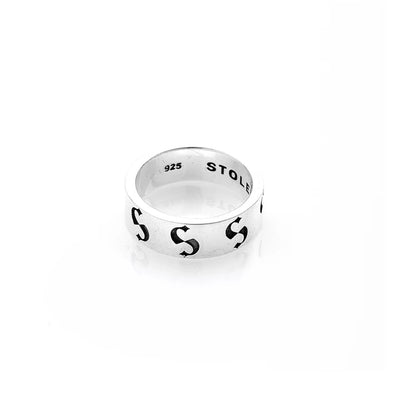 STOLEN GIRLFRIENDS CLUB S-LOGO IMPRINT BAND NARROW  The Stolen Girlfriends Club S-Logo Imprint band is available in a narrow cut, and features oxidised black out signature 'Stolen S's' around the outer band, and matching oxidised blaked out 'STOLEN' on the inner band. 
