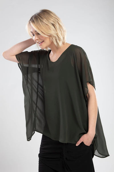 NES CIVITA TOP  The Nes Civita Top is a sheer staple for everyday wear. Crafted from 100% polyester, this easy to wear top is loose and flowing, with angled sleeves and a slight drop tail, featuring a split detail on the left side, ideal for tying up or tucking in.   See the Nes Civita Top teamed back with the Nes Roxi Pant in black  Sizes S/M , M/L 100% Polyester Angled sleeves Slight drop tail Left side split detail