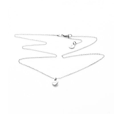 STOLEN GIRLFRIENDS CLUB STOLEN HEART NECKLACE  The Stolen Girlfriends Club Stolen Heart Necklace is a fine feminine necklace perfect for daily or occasion wear.  The Stolen Heart Necklace features a fine chain, suspending a fine heart with with a signature 'Stolen' engraved through the middle. Simple, stylish and easy-to-wear  Wear The Stolen Girlfriends Club Stolen Heart Necklace back with the matching Stolen Girlfriends Club Heart Earrings to add style to any outfit 