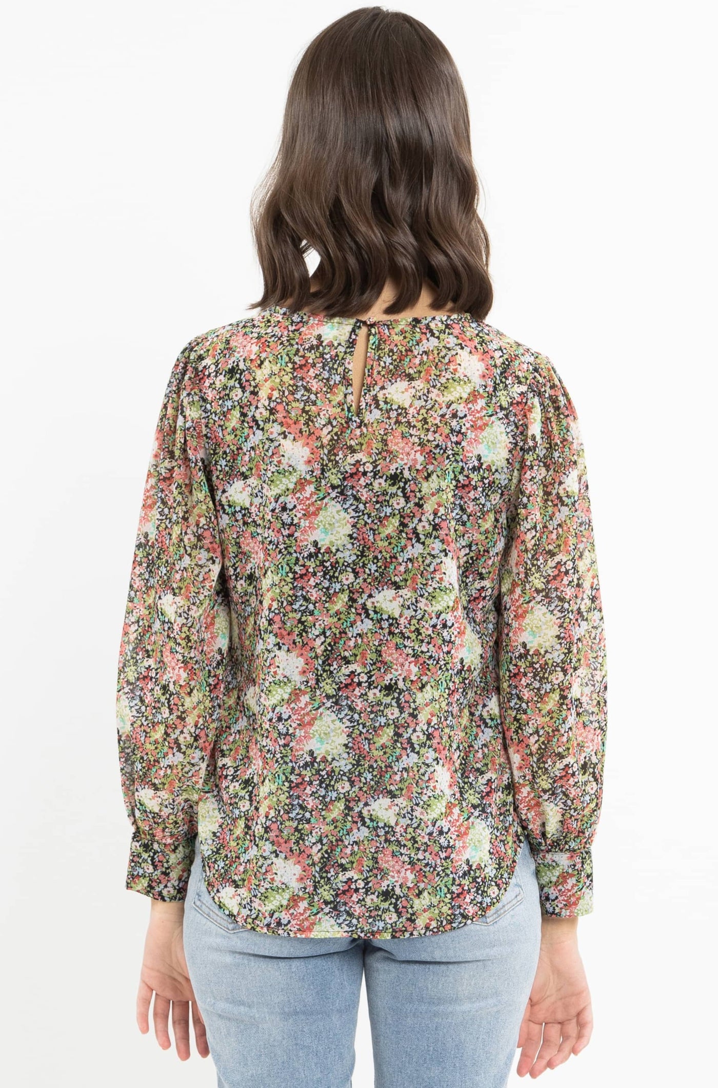 LEILA + Luca Forever Top - Multi Floral  The Leila + Luca Forever Top is a gorgeous feminine long sleeve which can easily be dressed up or down.  It features elasticated ruched sleeve cuffs, each sporting a single ruffle, finished with a gently curved hemline dropping slightly lower at the back and keyhole closure.      Sizes; 8, 10, 12, 14     Elasticated ruched sleeve cuffs     Curved hemline     100% Polyester