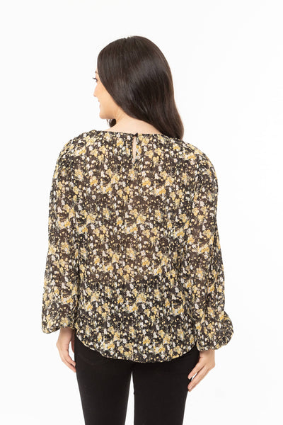 The Carefree Top is available in this lovely soft yellow and black floral print. It is a boxy style fit with bell sleeves finished with elasticated cuffs. This crinkle fabric can be worn day or night.   100% polyester crinkle fabric elasticated cuffs bell sleeves  generous fit