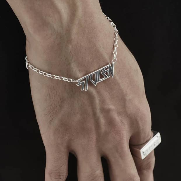 STOLEN GIRLFRIENDS CLUB BERATE BRACELET  The Stolen Girlfriends Club Berate Bracelet is a simple feminine bracelet perfect for daily wear. The Berate bracelet features a fine chain with 'Stolen' written in a connected futuristic font, finished with a classic clasp closure. Simple, modern and stylish, wear the Stolen Girlfriends Club Berate Bracelet daily or for your chosen occasion.