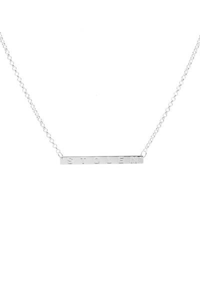 STOLEN GIRLFRIENDS CLUB PLANK NECKLACE - GOLD PLATED  The Stolen Girlfriends Club Plank Necklace is now available in Silver and Gold Plated.   The Plank features the word "STOLEN" engraved across a high gloss gold or silver bar, with each end attached to the fine chain. This is a simple dainty style that will add a little edge to any outfit. 