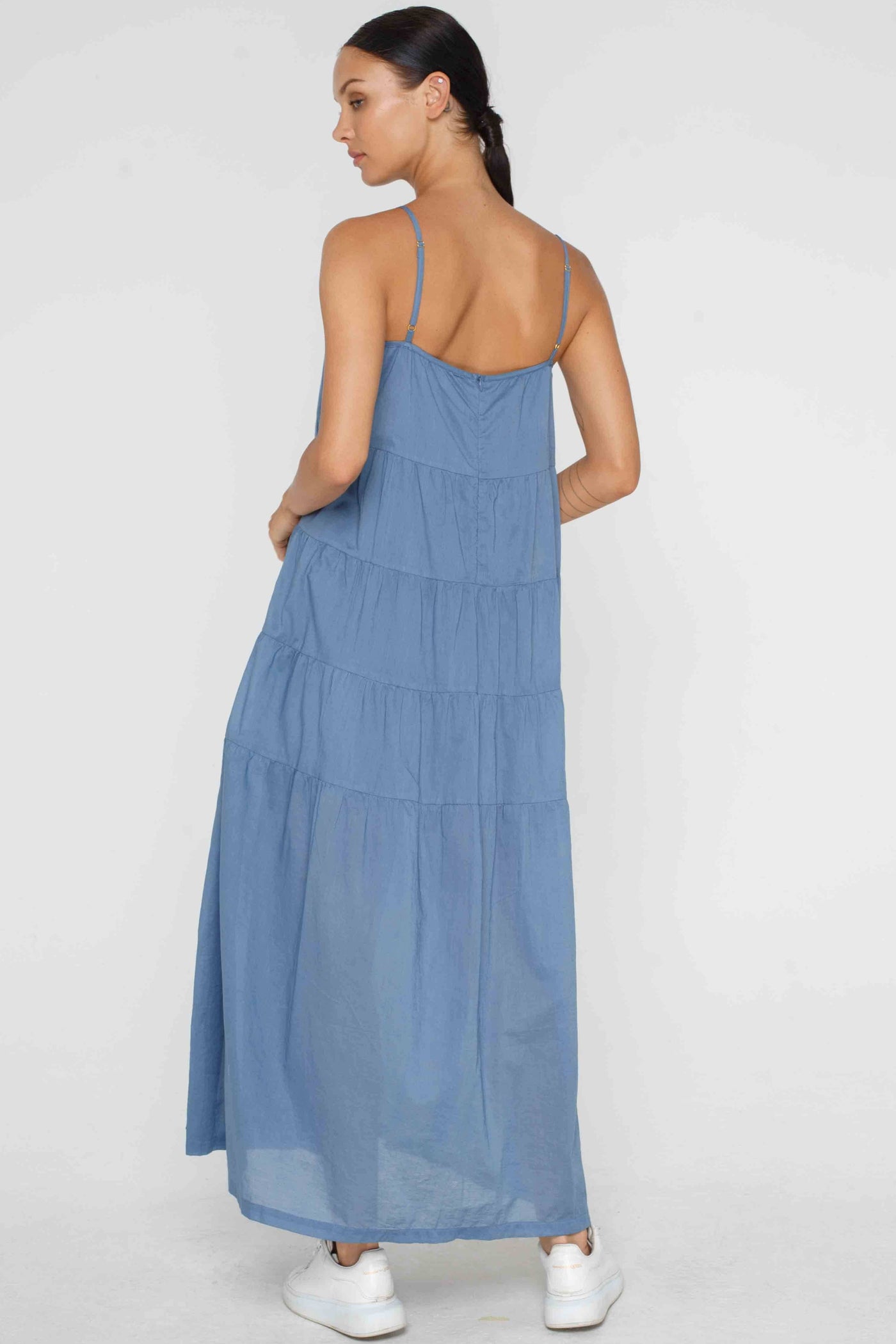 BLAK CARMEN DRESS - DENIM BLUE  The Blak Carmen Dress is a relaxed fitting maxi length now available in Denim Blue.  The Carmen Dress can easily be dressed up or down and looks great layered over a fitted tee. 