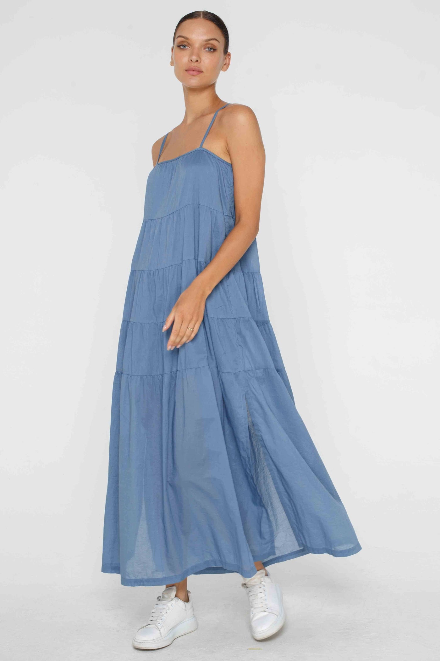 BLAK CARMEN DRESS - DENIM BLUE  The Blak Carmen Dress is a relaxed fitting maxi length now available in Denim Blue.  The Carmen Dress can easily be dressed up or down and looks great layered over a fitted tee. 
