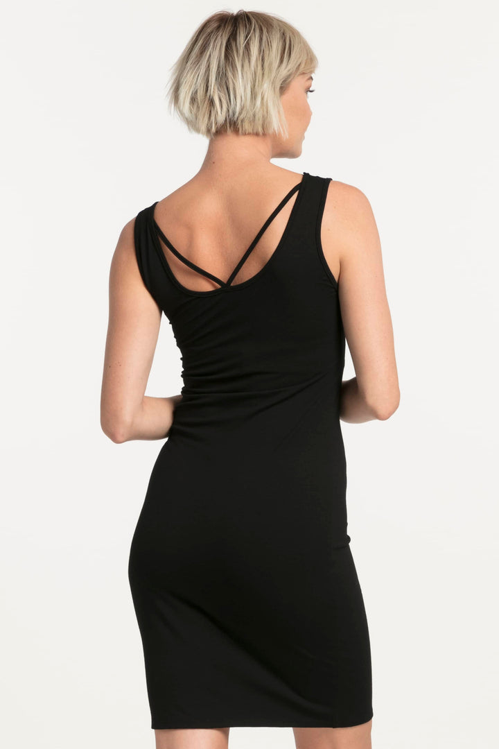 NES MID LATTICE SLIP  The Nes Mid Lattice Slip is a wardrobe essential.  The Mid Lattice slip is crafted in a soft viscose blend and features strap detailing which can be worn at either the front or back.  The Mid Lattice slip is a longer updated take on the classic Nes Lattice Singlet we all know and love, this new length is ideal for shorter dresses  The Nes Lattice slip looks great worn alone or is the perfect layering piece for under your sheer dresses.