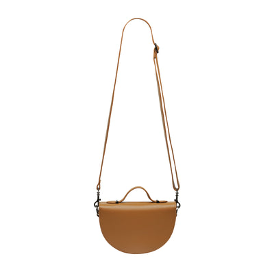 STATUS ANXIETY ALL NIGHTER BAG - TAN  The Status Anxiety All Nighter Bag is a simple stylish cross body bag, perfect for daily use as it easily fits all your essentials, and can also be carried by the top handle for an alternative bag style.