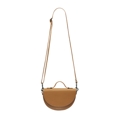 STATUS ANXIETY ALL NIGHTER BAG - TAN  The Status Anxiety All Nighter Bag is a simple stylish cross body bag, perfect for daily use as it easily fits all your essentials, and can also be carried by the top handle for an alternative bag style.