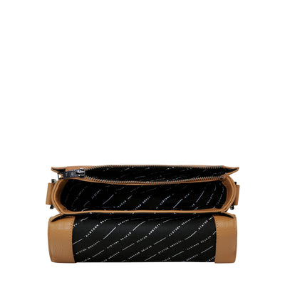 STATUS ANXIETY ALL NIGHTER BAG - TAN  The Status Anxiety All Nighter Bag is a simple stylish cross body bag, perfect for daily use as it easily fits all your essentials, and can also be carried by the top handle for an alternative bag style.