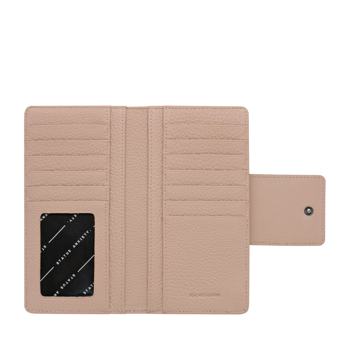 STATUS ANXIETY RUINS WALLET   The Status Anxiety Ruins Wallet is an easy-to-carry wallet, with a slim silhouette and profile, making it perfect for daily use and any outfit.  The Ruins Wallet features a oversized clip clasp to close, with a large external coin pocket, and plenty of internal card slots, and individual bank note spaces. The outside zipper section makes for easy access to your cash without having to open the main section of the wallet.