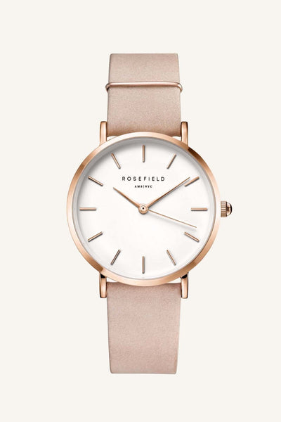 ROSEFIELD WEST VILLAGE WATCH  The Rosefield West Village Watch is a beautiful feminine watch sporting unique metal plated rings for added individuality and style, this watch effortlessly compliments any outfit weather it be causal or formal!  The West Village Watch features a subtle pearl sheen on the face, has a raw-cut unstitched leather strap, and is perfect for daily or occasion wear.